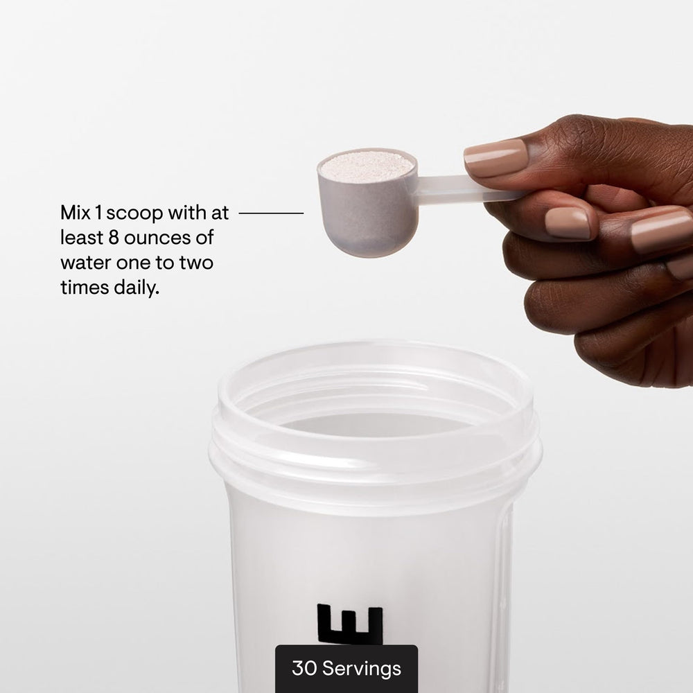 Pouring THORNE Amino Complex into a glass after training