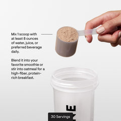 THORNE mixer bottle with chocolate protein ready for on-the-go use.