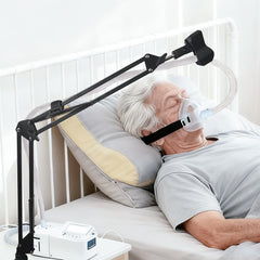 ThreeDokke CPAP hose holder with adjustable swivel arm keeps hoses organized and tangle-free.