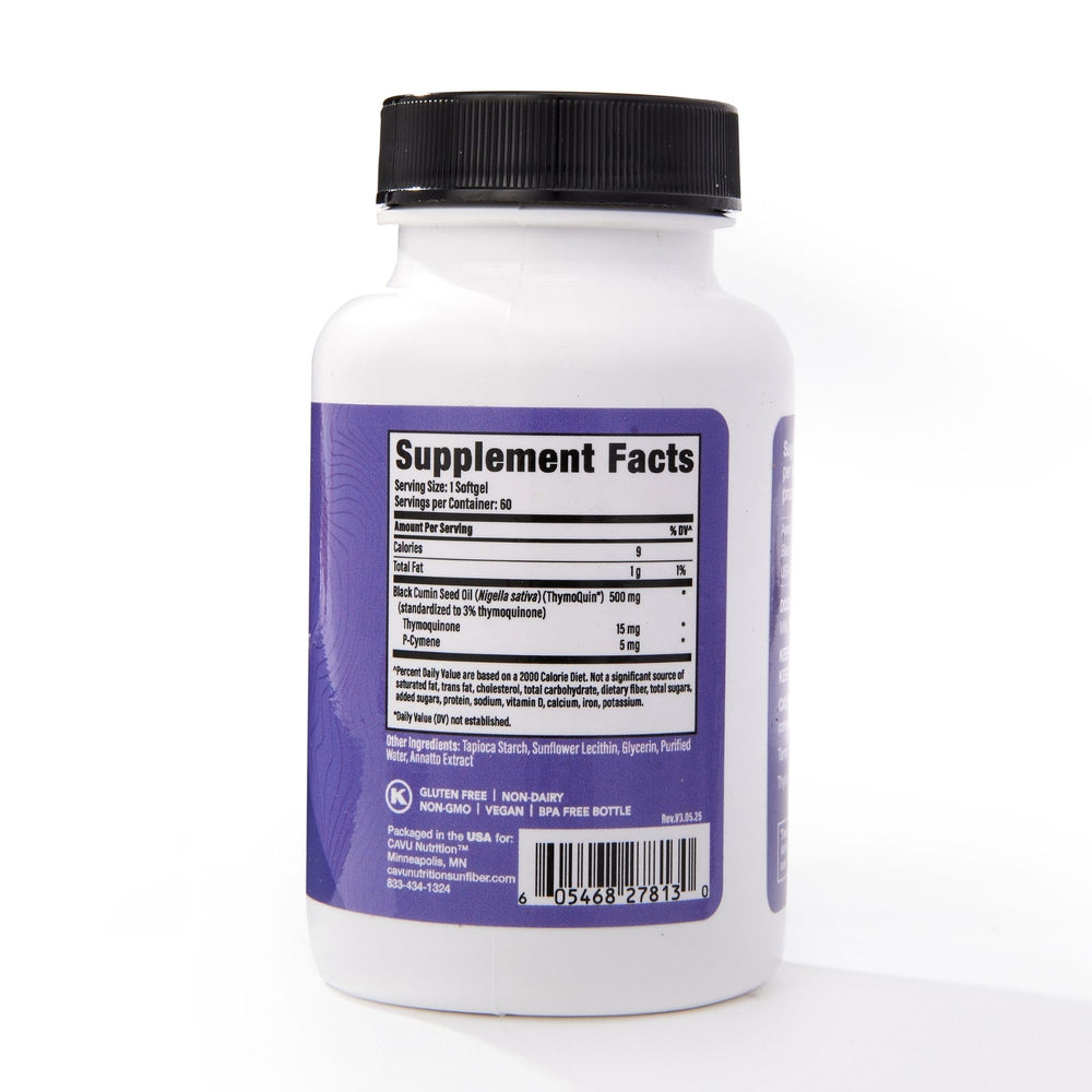 Full-spectrum black seed oil pour from ThymoQuin bottle emphasizing purity and concentration.