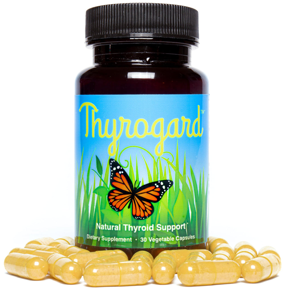 Thyrogard capsules with water used daily to support routine.