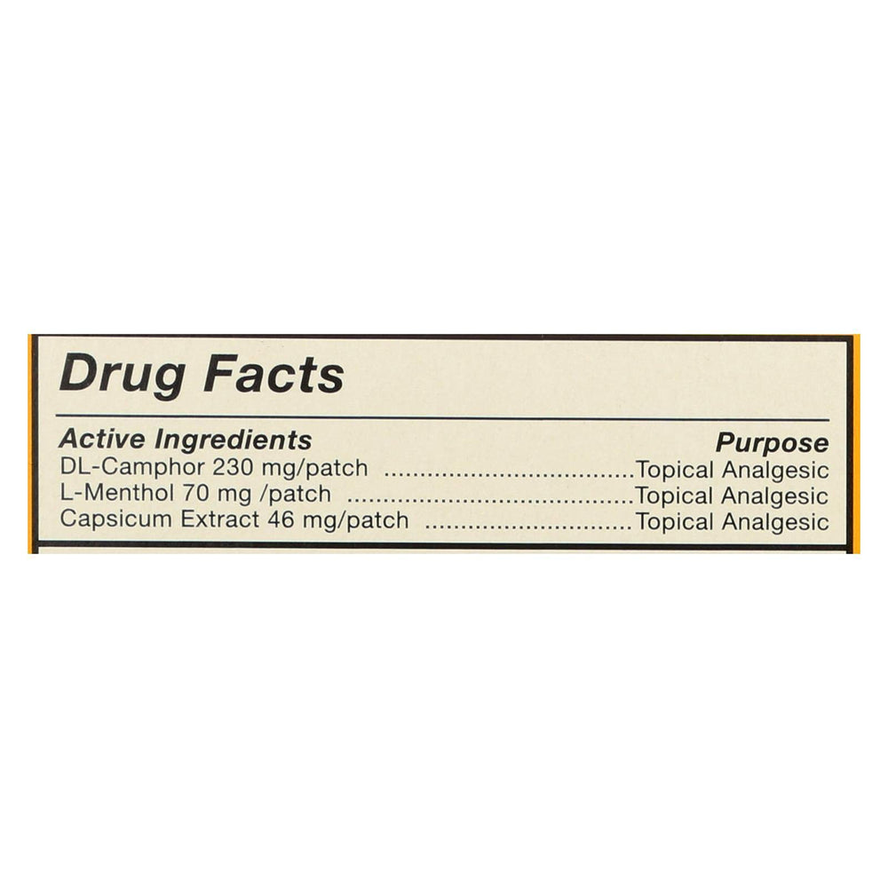 Tiger Balm large patch applied to shoulder area for temporary soothing relief.