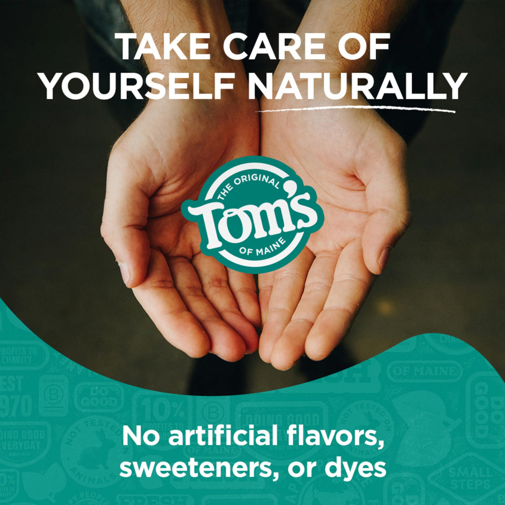 Close-up of ingredient area on Tom's of Maine bottle showing no artificial dyes.