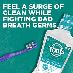 Sea salt crystals photographed beside Tom's of Maine Mouthwash highlight natural freshening.