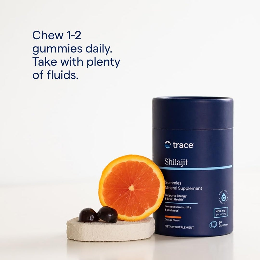 Trace Minerals Shilajit Gummies chew closeup showcasing tasty orange flavor.