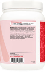 TransformHQ Fruit Punch collagen powder mixing into a glass of water.