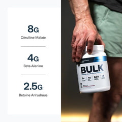 Transparent Labs Bulk Pre-Workout blue raspberry in hand suggests on the go use