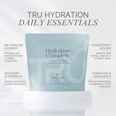 TRU Supplements Hydration Complete powder being poured into a glass for workouts.