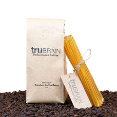 TruBrain nootropic coffee enhancer bottle close-up highlighting a focus-boosting blend.