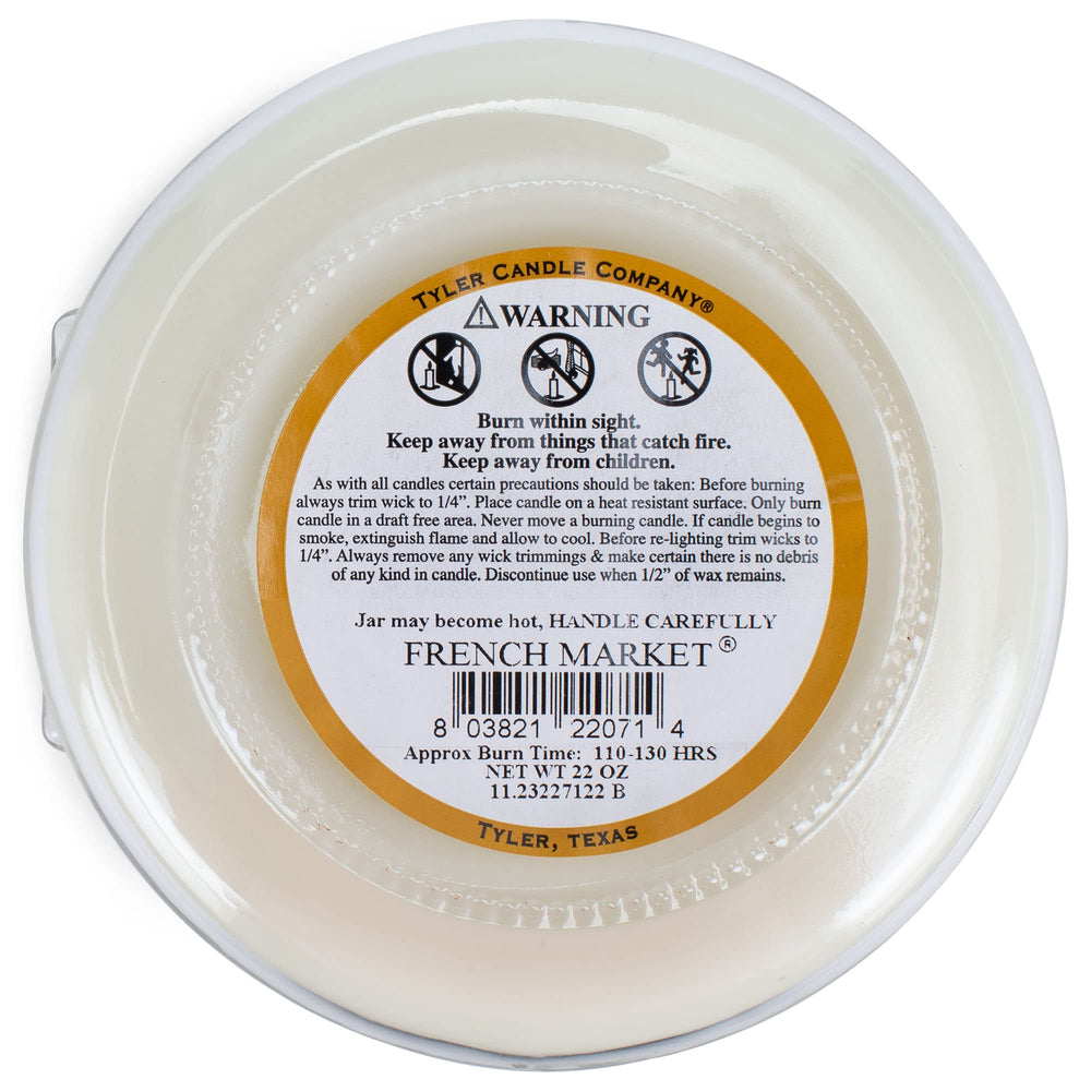 Tyler Creamy White candles in protective packaging, ideal for gifting.