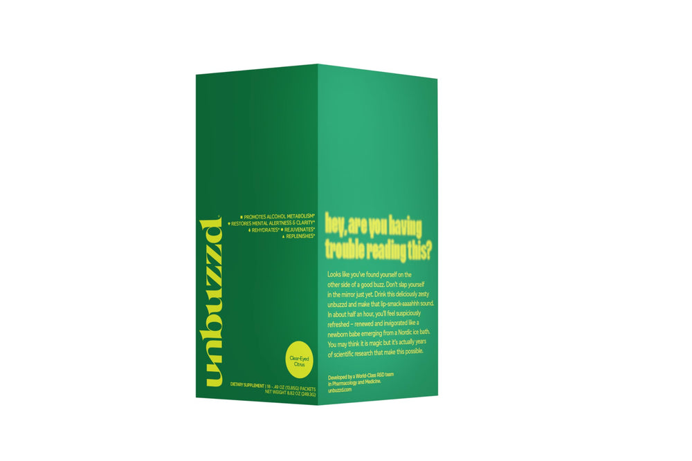 unbuzzd stick packs on a desk ready for quick hydration during the day.