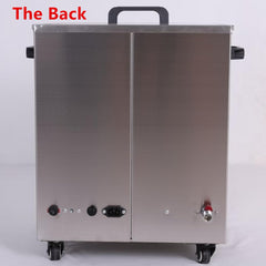 Insulated 35-liter tank holds six moist heat packs for sessions
