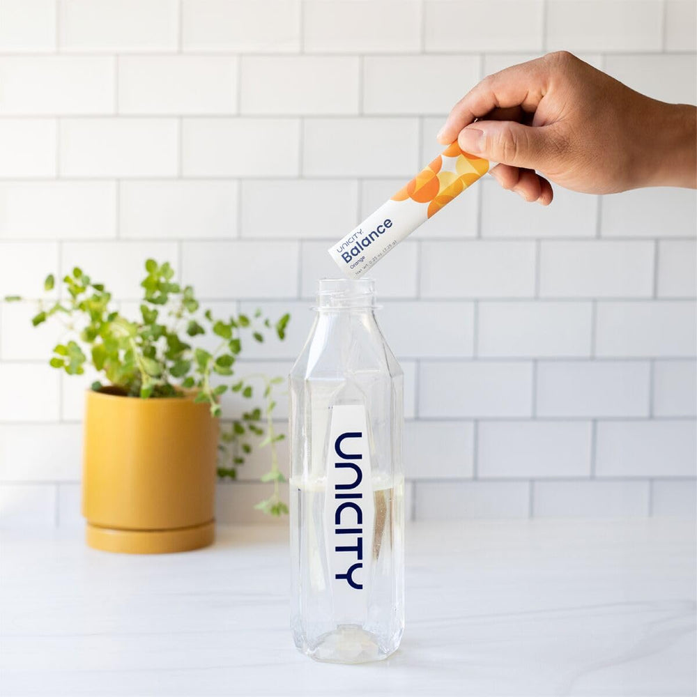 Unicity UNIMATE Lemon Ginger sachets for quick, uplifting mornings.