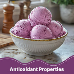 Pouring UNLEASH'D ORGANIC Purple Potato Powder into a smoothie for color and nutrients.