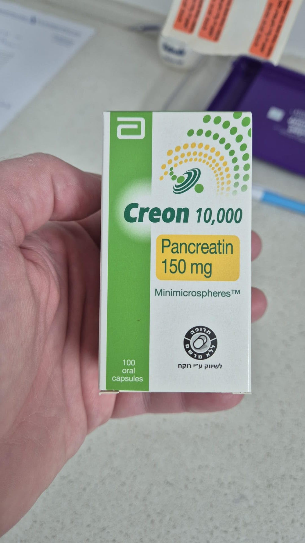 UPAX Creon 10,000 capsules close-up highlighting lipase, protease, amylase enzymes