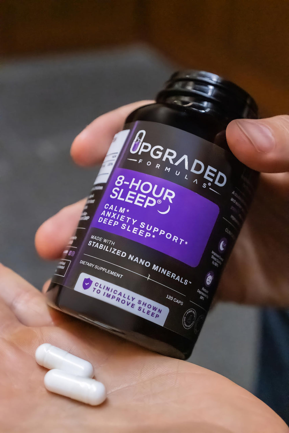 Upgraded Formulas 8-Hour Sleep night-time scene with water promotes relaxation before bed.