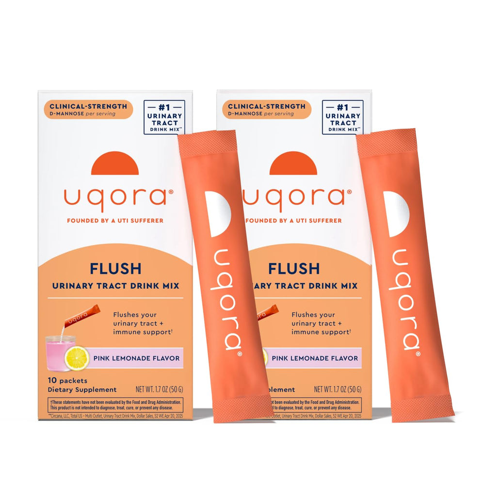 Uqora Flush pink lemonade packet poured into water for daily urinary routine