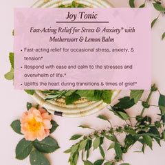 Urban Moonshine Joy Tonic close-up highlights motherwort and lemon balm herbs.