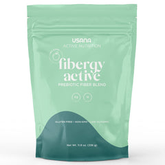 USANA Fibergy Active powder dispensing scene shows easy daily mixing for digestion.