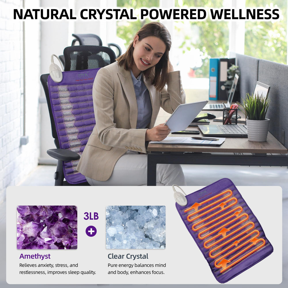 UTK amethyst stones heating pad on abdomen offering calming warmth.