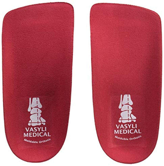 Vasyli Custom 3/4 Length Insoles red undergoing heat molding for a personalized fit.