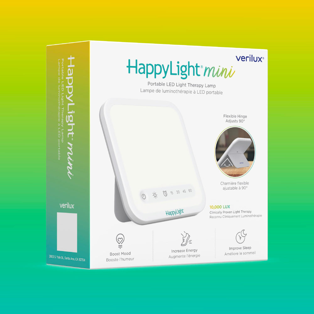 Verilux HappyLight Mini in an office setup for focused work