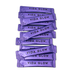 Close-up of Vida Glow Marine Collagen powder dissolving in smoothie.