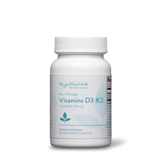 VIDAPURA Ray of Strength D3K2 bottle on table showing premium bone and immune support