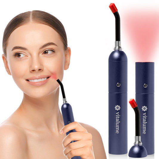 Vitalume red light therapy wand focused on the face for targeted relief and skin support.