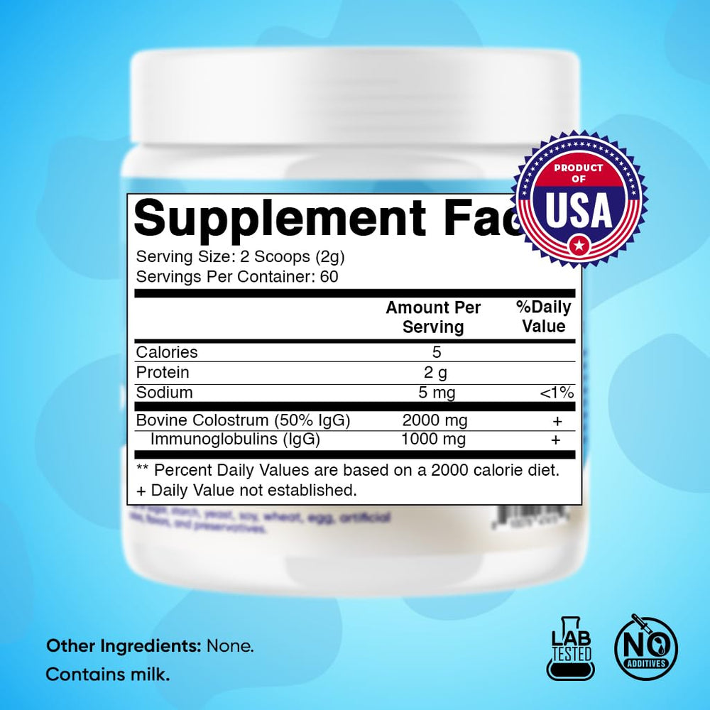 Vitamatic Bovine Colostrum Powder scoop beside container for convenient 2 g servings