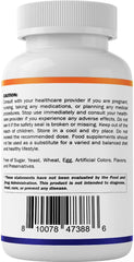 Vitamatic daily-use routine with capsules beside water emphasizes easy integration.