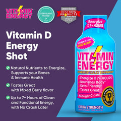 Vitamin Energy berry shot bottle on a desk with notebook.