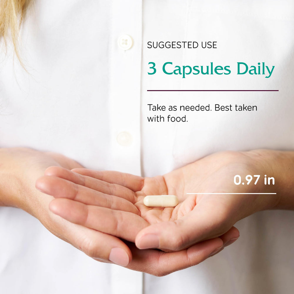 Vitanica Opti-Recovery capsules in hand illustrate a simple daily wellness routine after procedures.