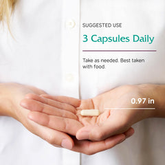 Vitanica Opti-Recovery capsules in hand illustrate a simple daily wellness routine after procedures.