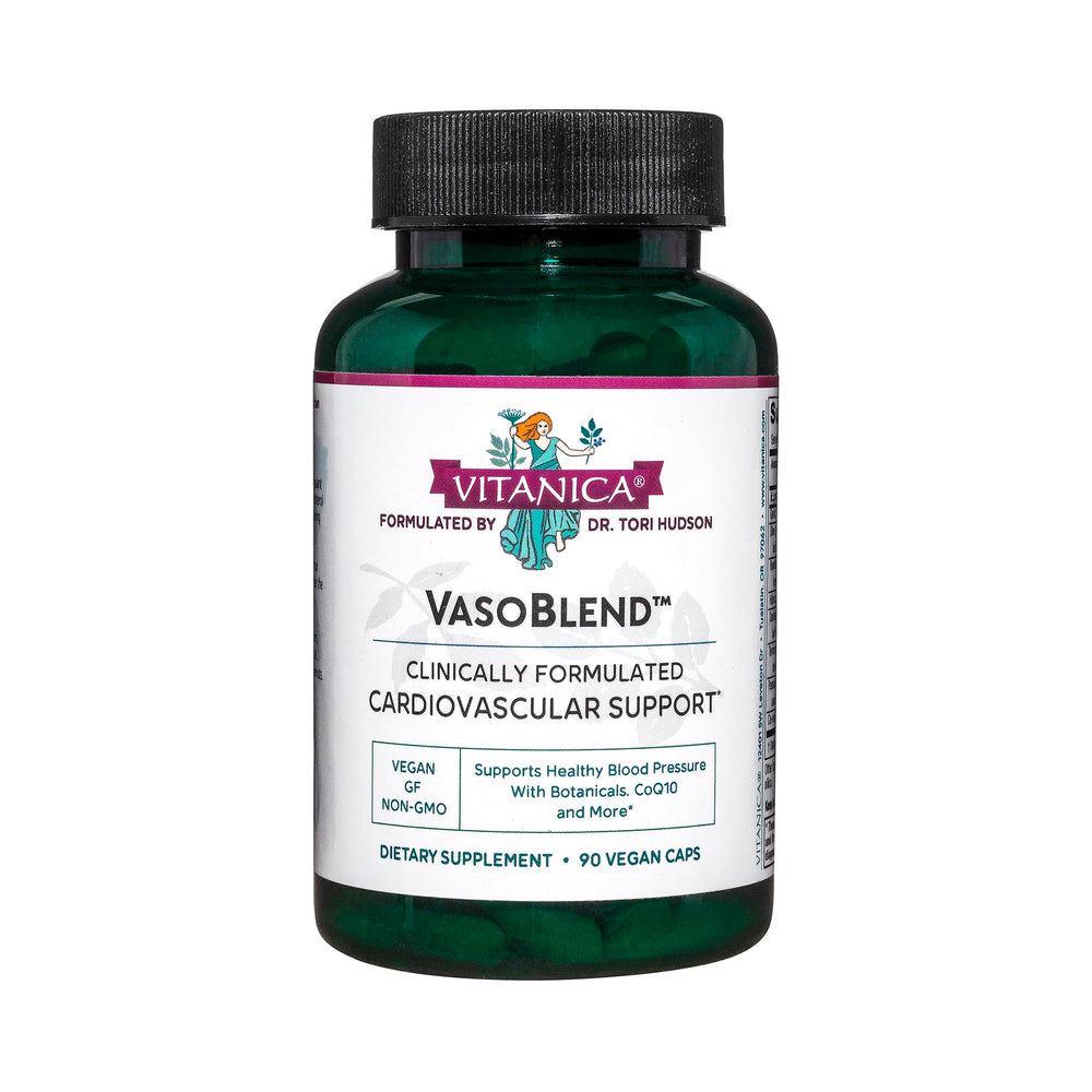 Vitanica VasoBlend bottle on desk suggests daily heart support with herbal blends