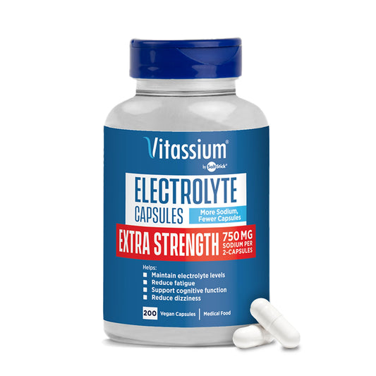 Vitassium bottle open showing unflavored electrolyte capsules for on-the-go use