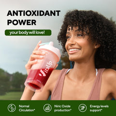 VitaUp Beet Root Powder 8in1 mixed-berry in a glass to show flavor.