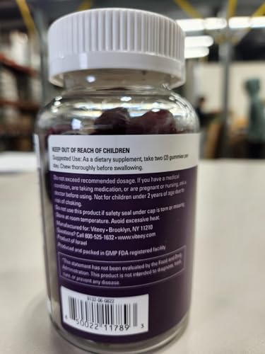 Viteey Moringa Gummies bottle with glass of water for daily routine