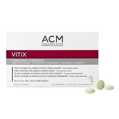 Close-up of Vitix ACM tablets with smooth coating for easy swallowing.