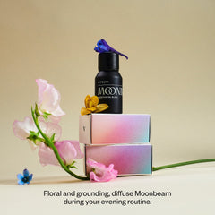 Vitruvi Moonbeam rose oil and jasmine notes for a romantic mood.