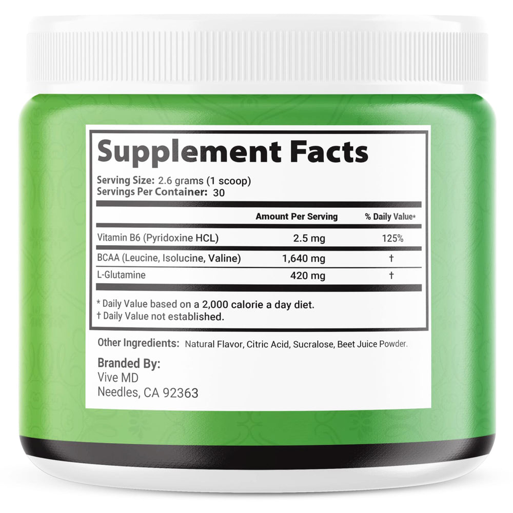 VIVE MD Tonic Greens scoop on a surface, convenient measure for daily supplementation.