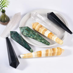 VIZYTOU Emerald Wand energy for chakra balancing during yoga sessions.