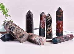 Vizytou obelisk used as a meditation focal point in a serene setup.