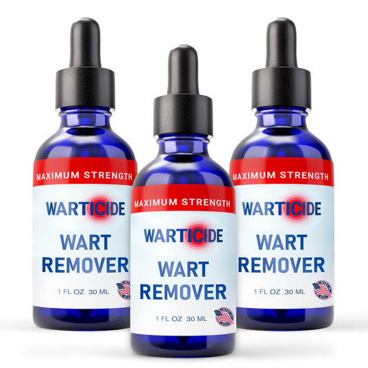 Warticide liquid wart remover dropper applying targeted treatment on skin.