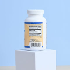 Well Wisdom Grass-fed Colostrum powder bag opened for easy daily mixing.