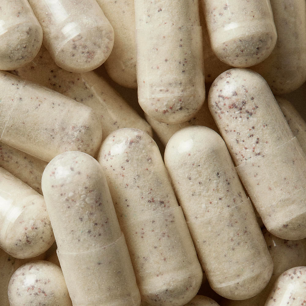 WELLBEL Men capsules added to smoothie for easy intake option.