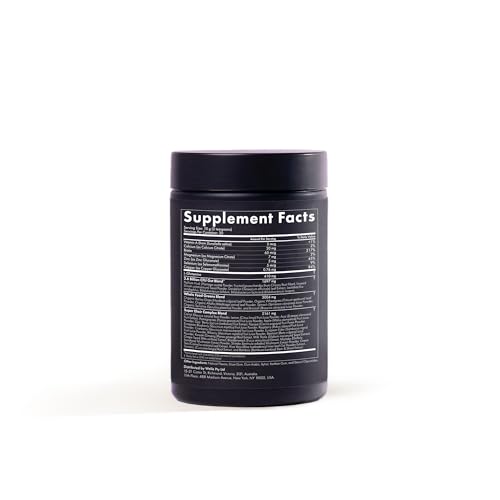 WelleCo The Super Elixir measuring scoop beside the container for precise daily servings.