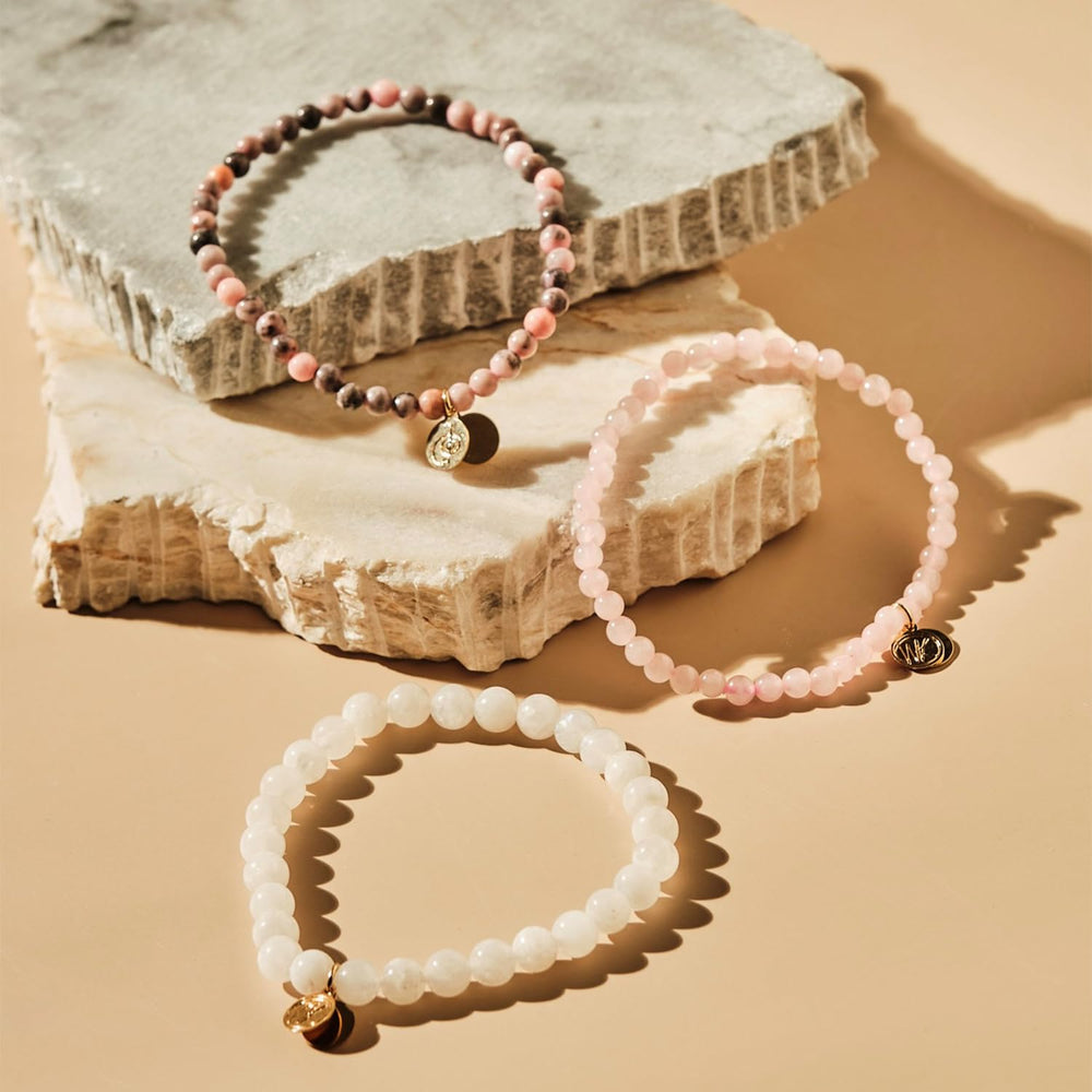 Wendy Kleiner Fertility Stack Reiki symbol emblem visible on beads