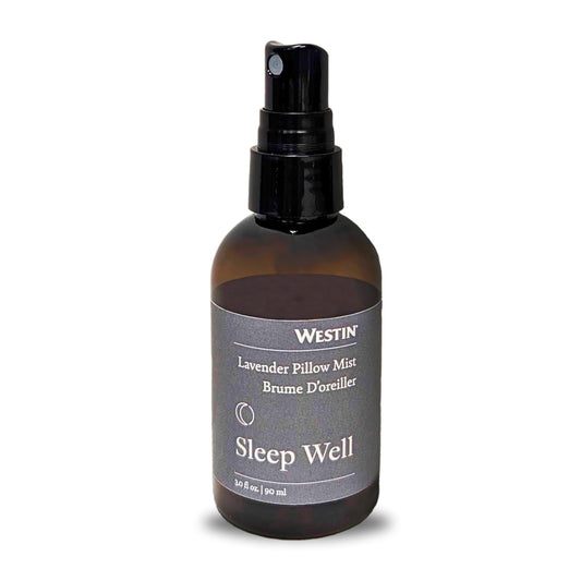 Westin Sleep Well Pillow Mist bottle releases lavender aroma for a calming bedtime ritual.