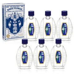 White Flower Balm Oil bottle pour for easy on-the-go application.